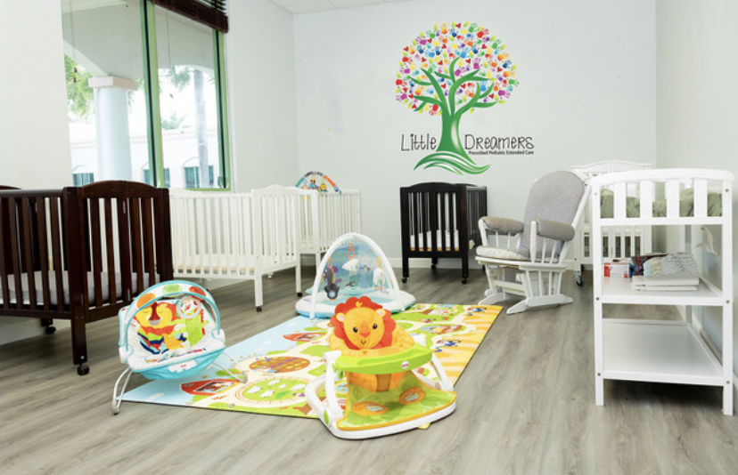 Infant and Toddler Room at Little Dreamers PPEC with cribs and changing station